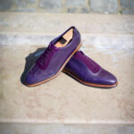 Le sneaker Aubercy en daim mauve et cuir violet